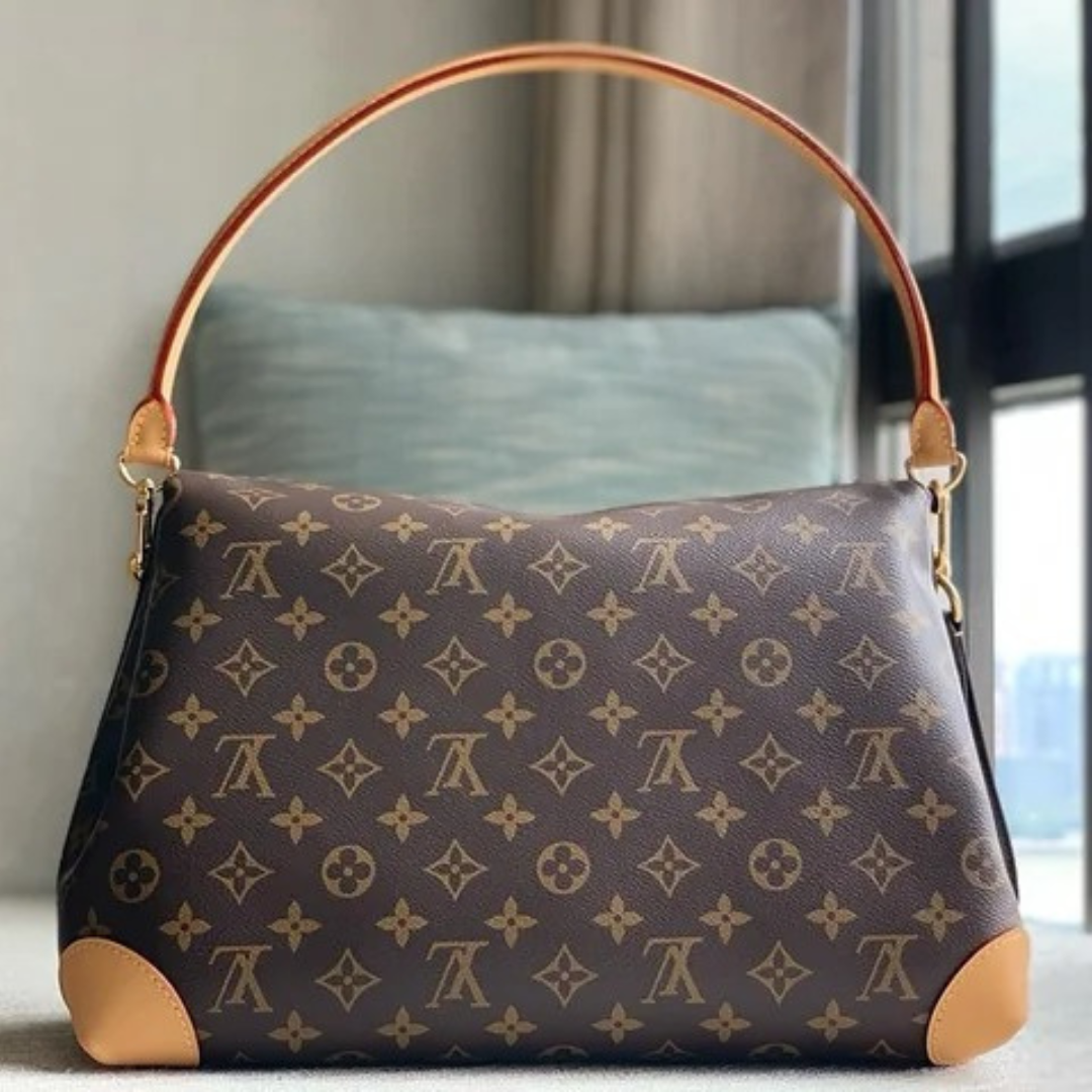 LOUIS VUITTON – CARTERA HIDE AWAY MM