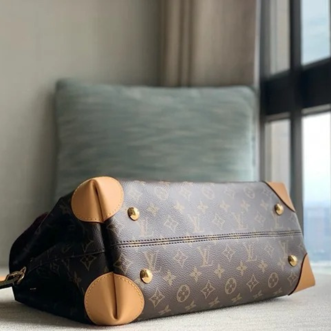 LOUIS VUITTON – CARTERA HIDE AWAY MM