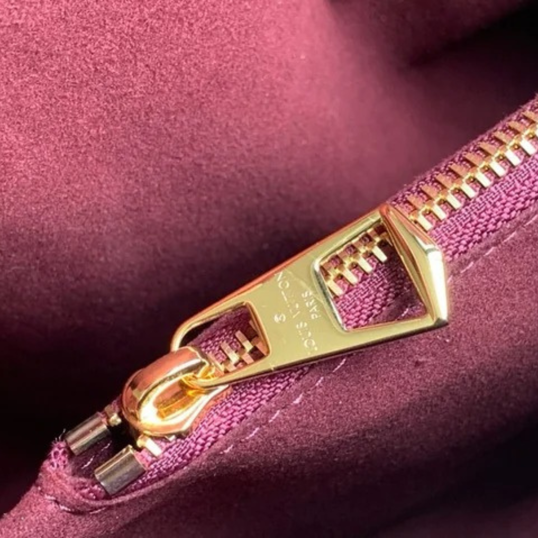 LOUIS VUITTON – CARTERA HIDE AWAY MM