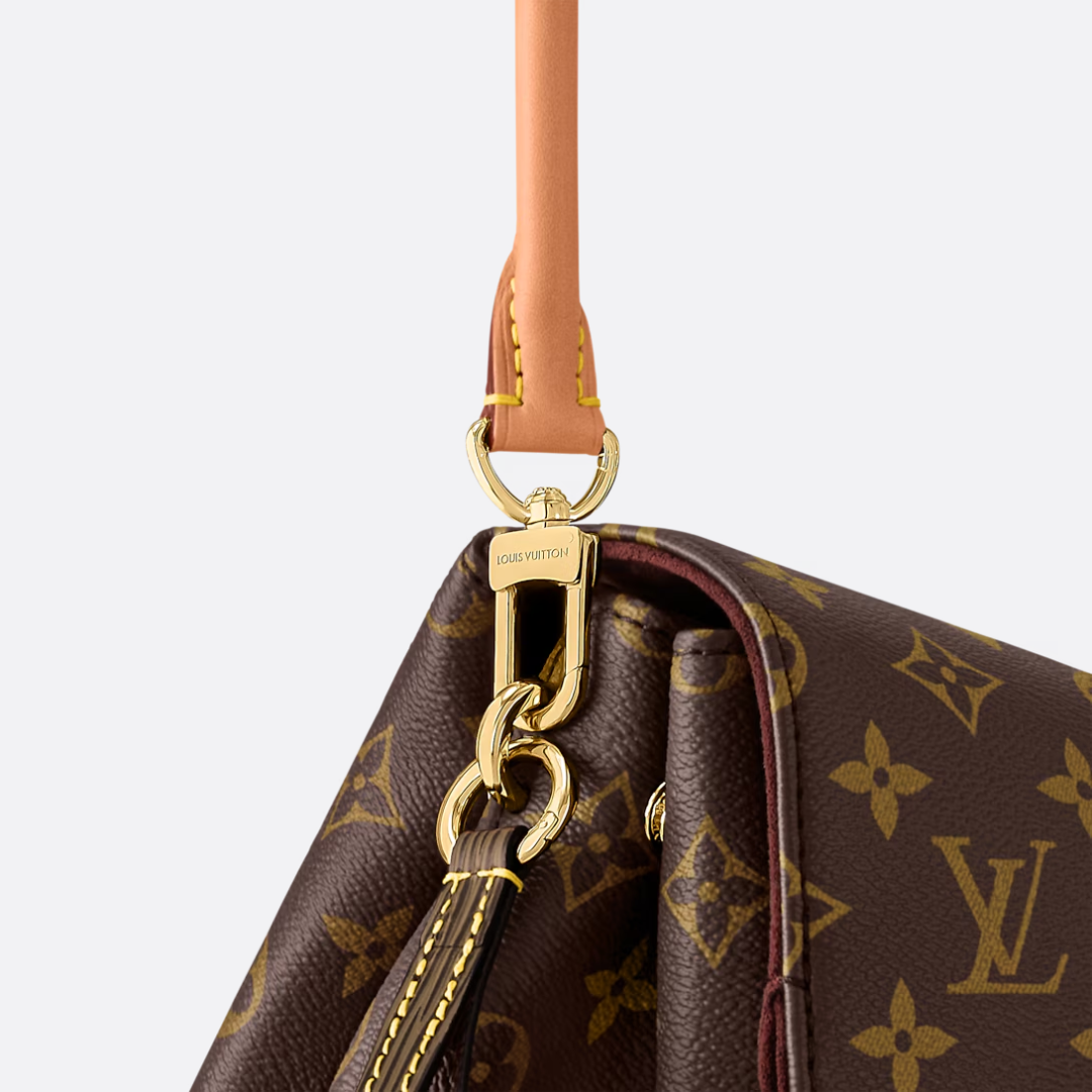 LOUIS VUITTON – CARTERA HIDE AWAY MM
