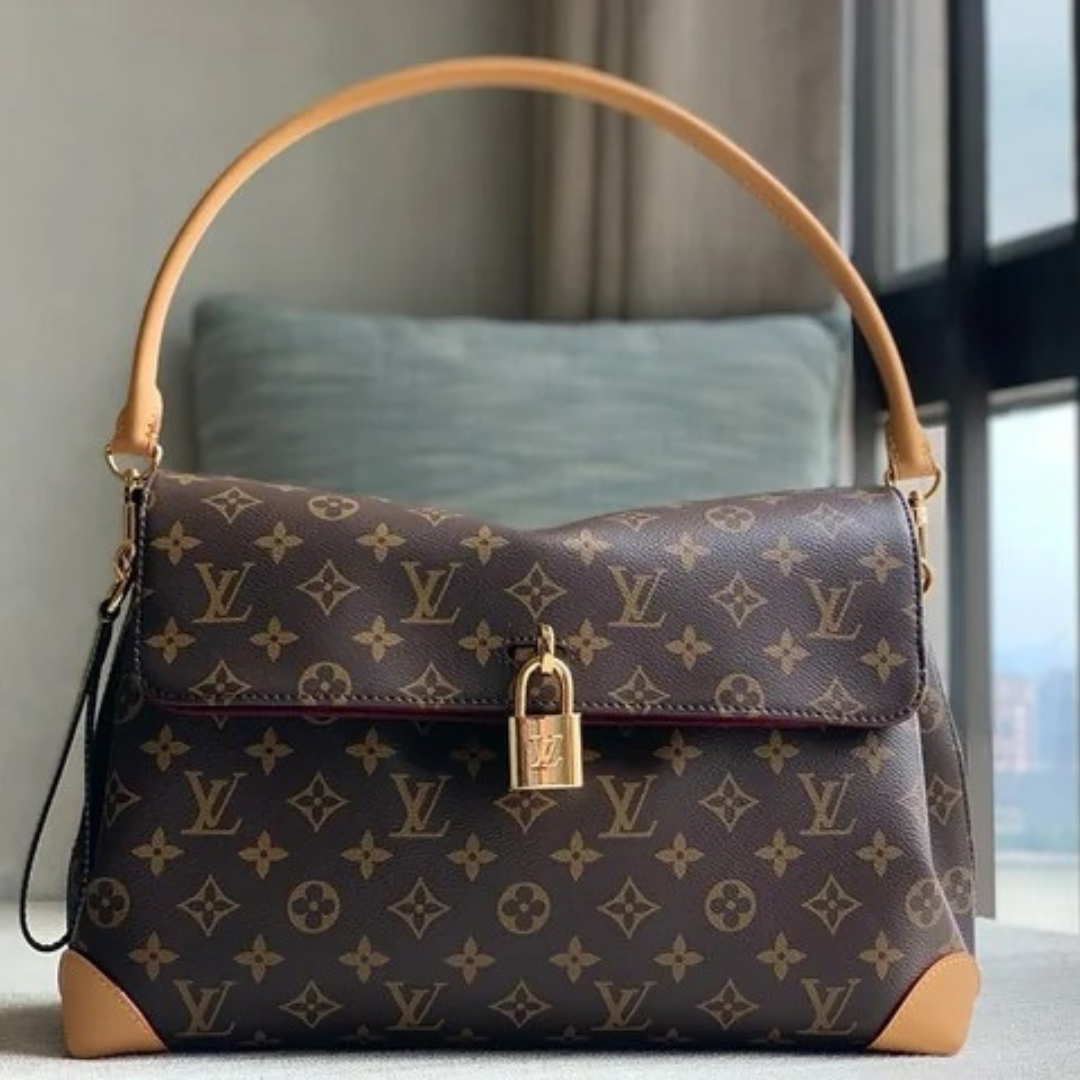 LOUIS VUITTON – CARTERA HIDE AWAY MM