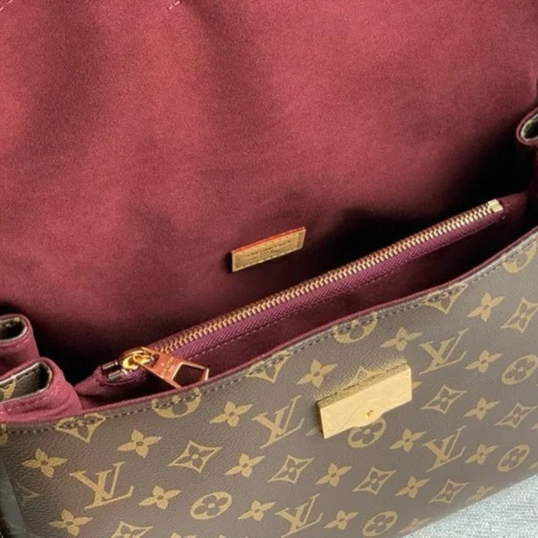 LOUIS VUITTON – CARTERA HIDE AWAY MM